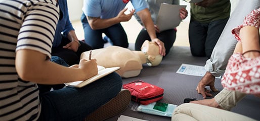 Expert First Aid instructor demonstrating emergency response techniques during courses in Paddington QLD