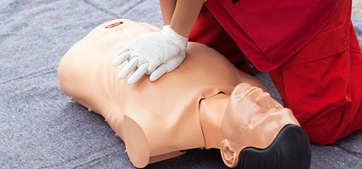 Students practicing CPR techniques on manikins during CPR courses in Teneriffe