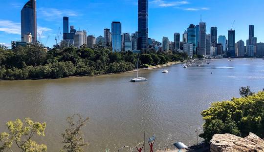 Kangaroo Point cliffs and Brisbane River viewed from the riverside parklands in Kangaroo Point QLD