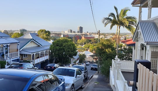 Given Terrace in Paddington QLD showing local shops and Queenslander architecture
